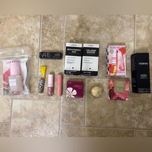 Bundle of unused full sized and sample skincare/makeup!
